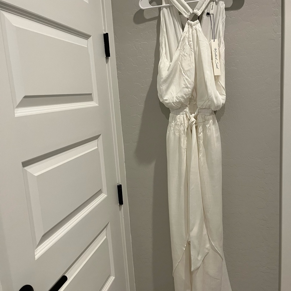Beautiful white cotton linen pant jumpsuit with side slits!
